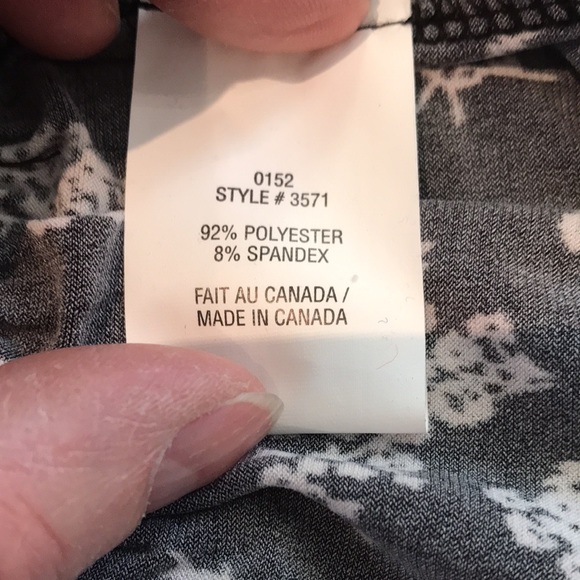 Flattering black and white flowy dress with double flap v neck collar. - Picture 9 of 15